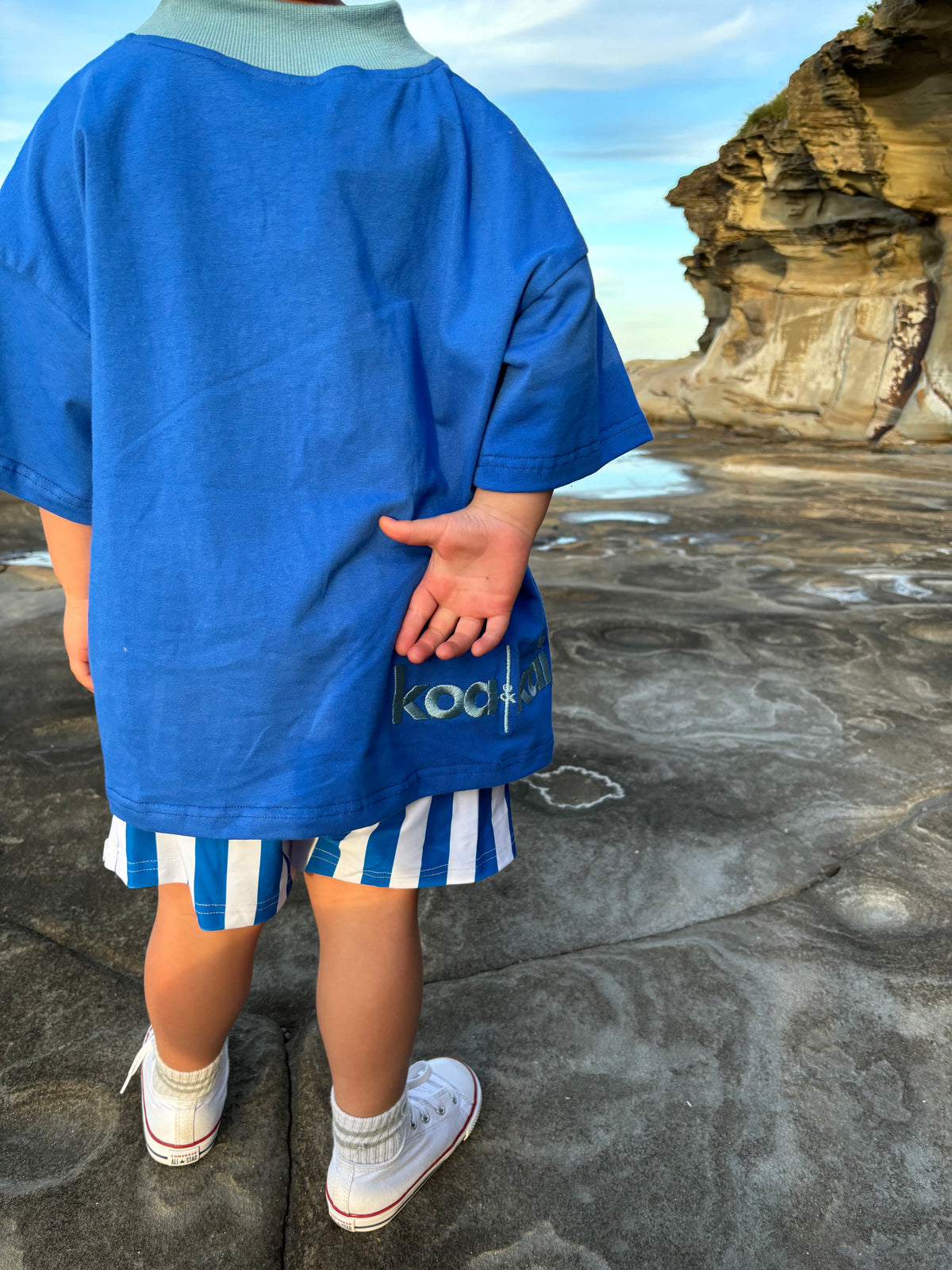 blue and white stripe boardshort koa and kai back hand